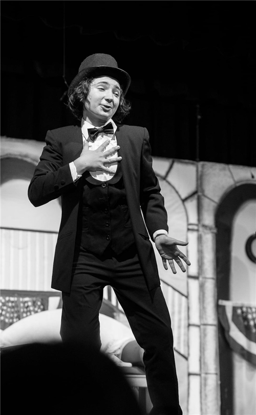 Student performing on stage
